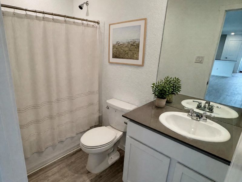 Furnished interior view inside a new home in Sapphire Grove, San Antonio (Image 11).