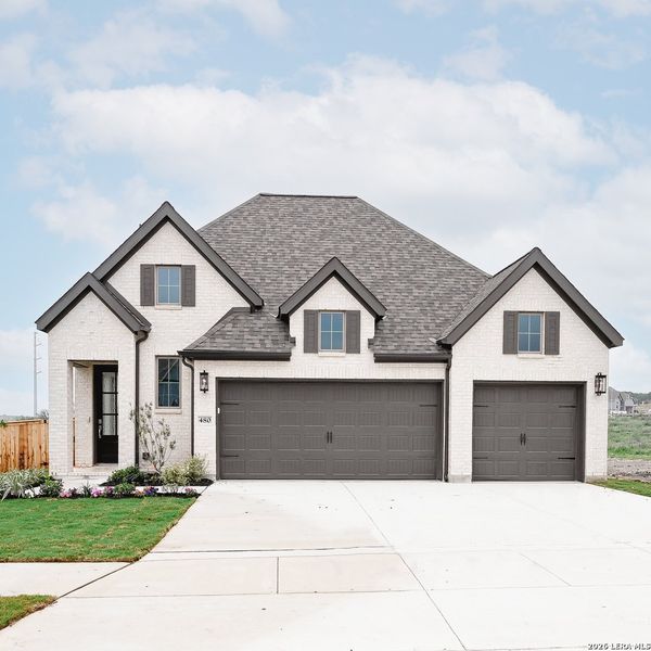 Front exterior of a new home in Mayfair, New Braunfels, TX, highlighting curb appeal (Image 21).