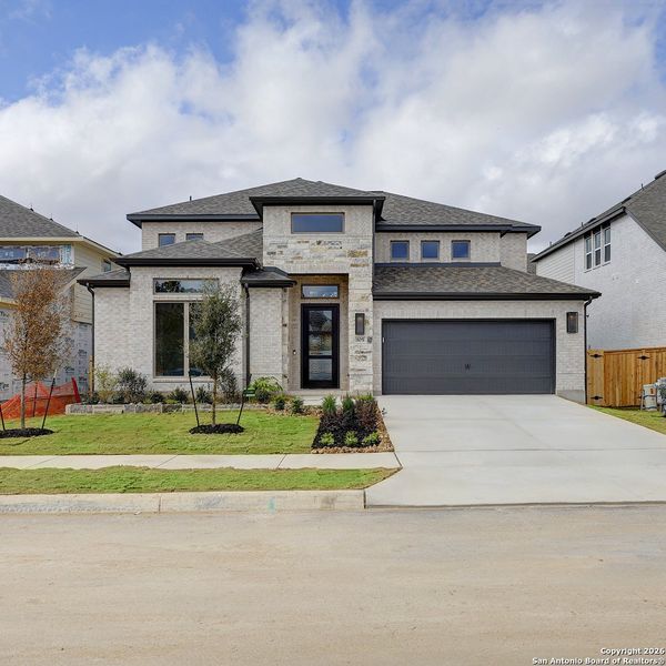 Front exterior of a new home in Ranches At Creekside 55', Boerne, TX, highlighting curb appeal (Image 2).
