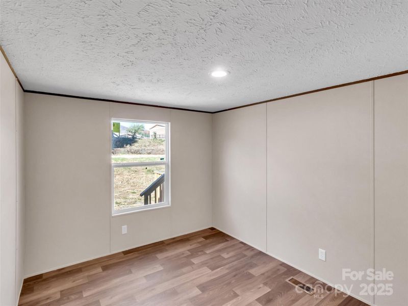 Spacious, unfurnished interior of a new home in , Waynesville (Image 12).