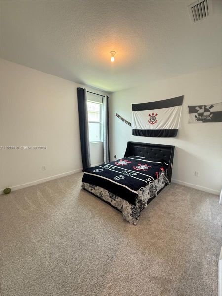 Furnished interior view inside a new home in Tradition, Port St. Lucie (Image 8).