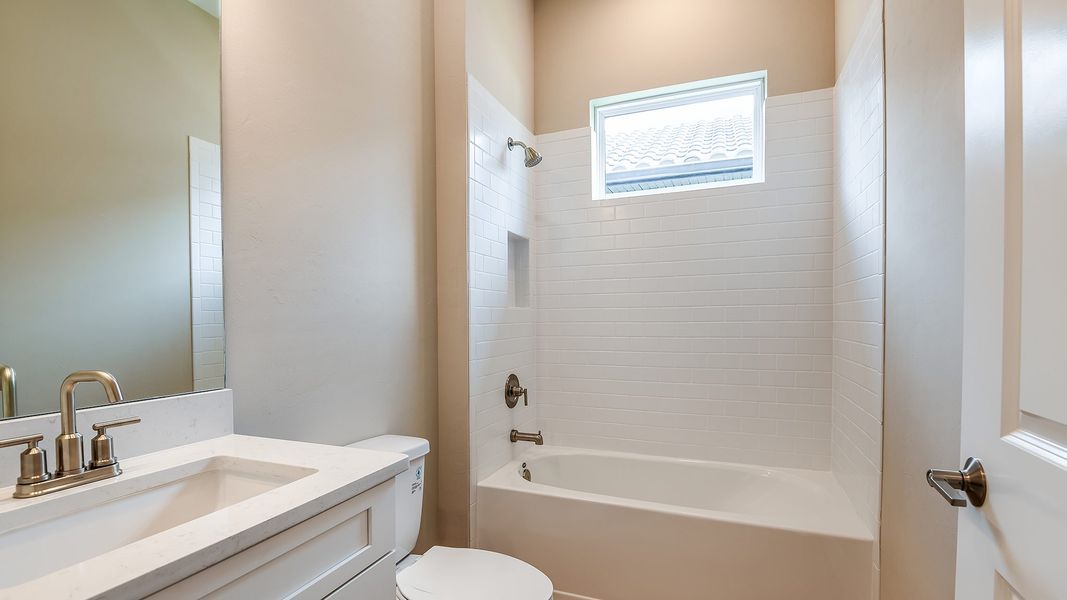 Furnished interior view inside a new home in Esplanade at Wiregrass Ranch, Wesley Chapel (Image 12).