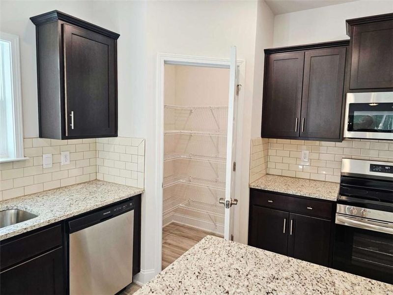 Furnished interior view inside a new home in Scarlett Place, Bowdon (Image 5).