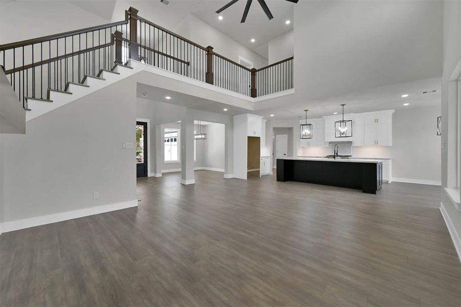 Similar View of the Kitchen and Stairs in a Home Built By Tx Best Home Builders