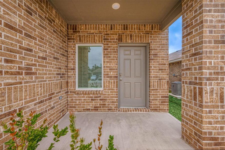 Exterior details and patio area of a home in Breckenridge Forest, Spring (Image 24).
