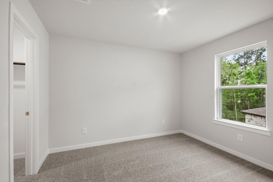 Spacious, unfurnished interior of a new home in The Woodlands Hills, Willis (Image 13).