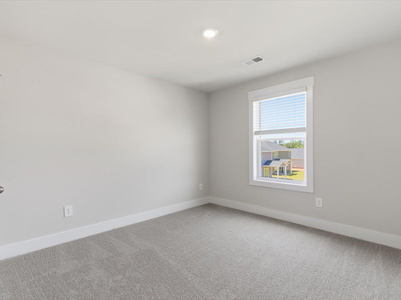 Spacious, unfurnished interior of a new home in Crossing at Abner Creek, Greer (Image 20).