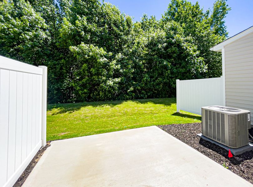 Front exterior of a new home in Fairview Village Townhomes, Simpsonville, SC, highlighting curb appeal (Image 16).