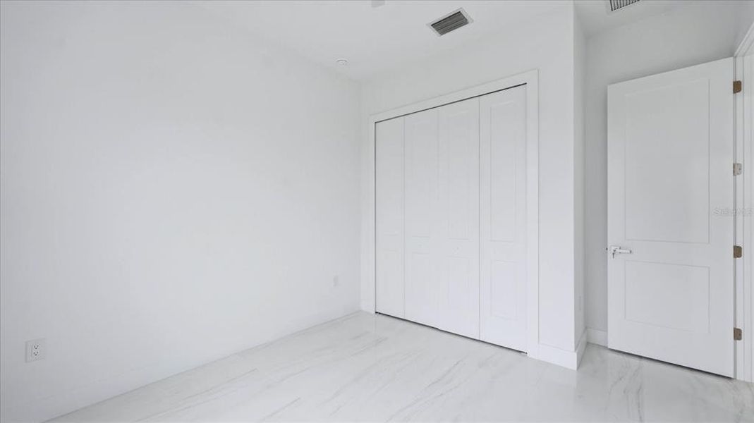 Spacious, unfurnished interior of a new home in , Port Charlotte (Image 32).