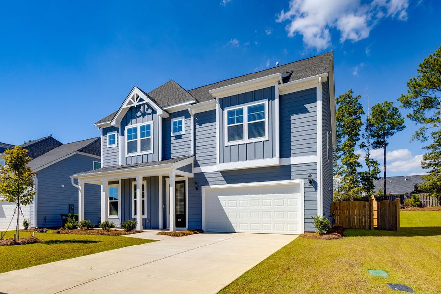 Front exterior of a new home in Pebble Branch, Chapin, SC, highlighting curb appeal (Image 27). Front exterior of a new home in Pebble Branch, Chapin, SC, highlighting curb appeal (Image 27).