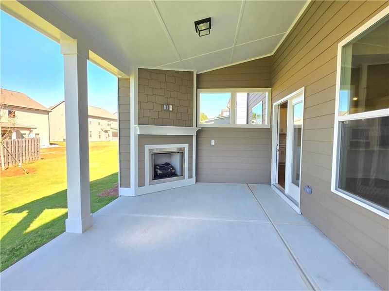 Exterior details and patio area of a home in Enclave at Logan Point, Loganville (Image 21).