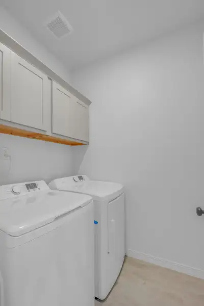 Furnished interior view inside a new home in Crossland, Clint (Image 7).