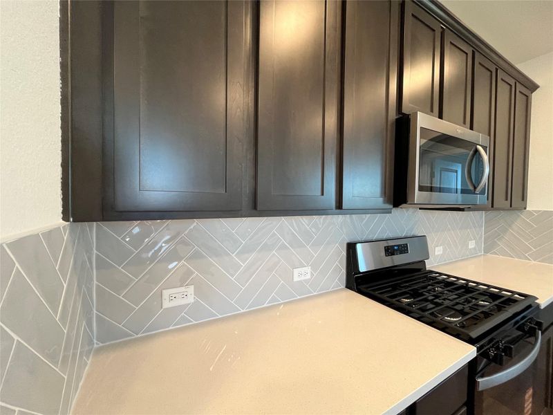 Subway tile layed in a herringbone pattern