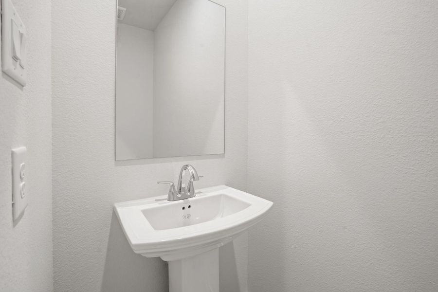 Close-up of interior finishes inside a home in Sunterra, Katy (Image 10).