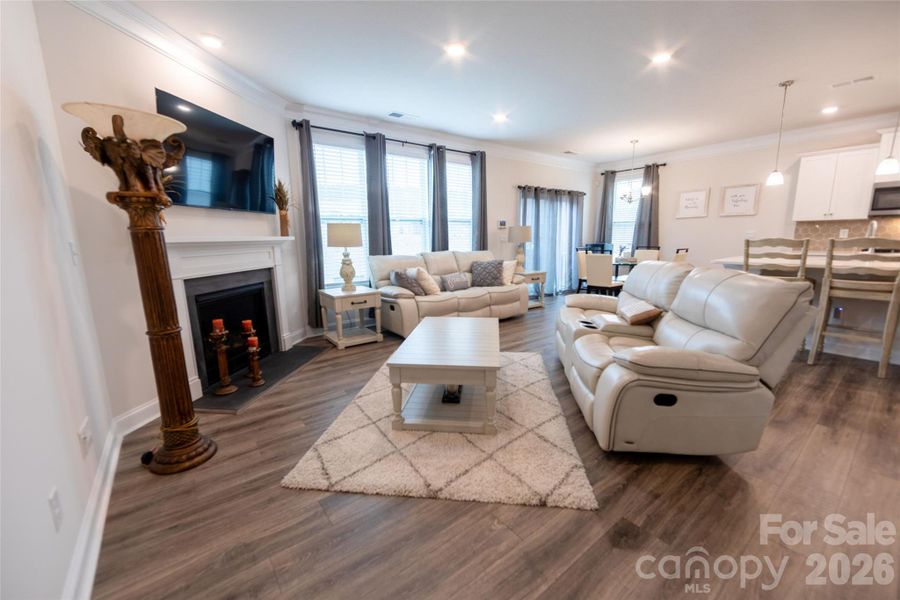 Open living space with a gas fireplace, perfect for relaxing or entertaining.