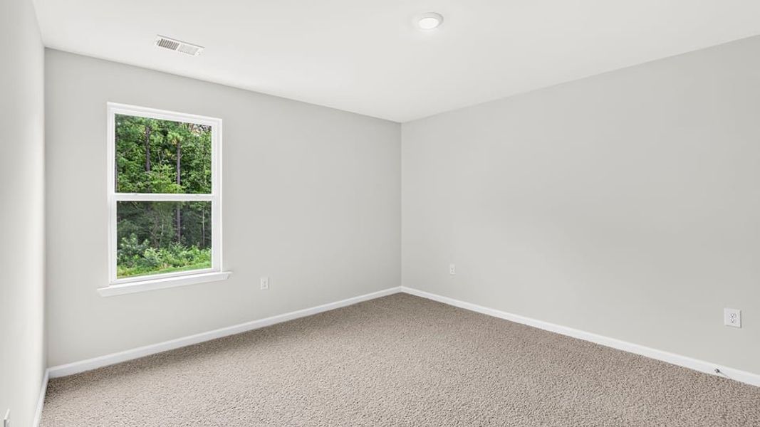 Spacious, unfurnished interior of a new home in Ravencrest, Roebuck (Image 28).