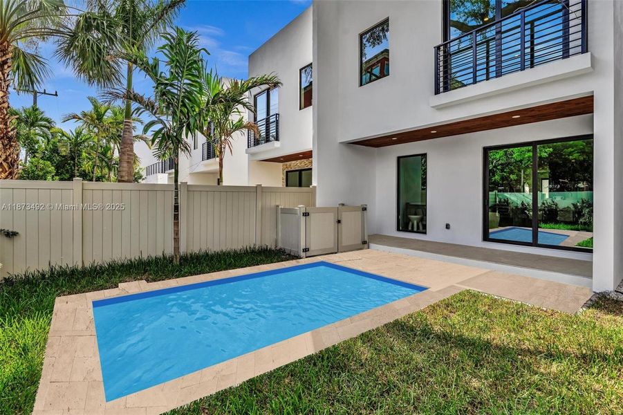 Front exterior of a new home in , Miami, FL, highlighting curb appeal (Image 25). Front exterior of a new home in , Miami, FL, highlighting curb appeal (Image 25).