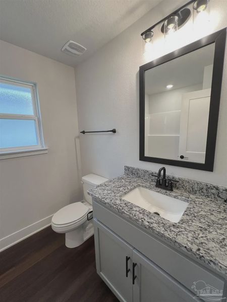 Furnished interior view inside a new home in Pine Top, Cantonment (Image 5).