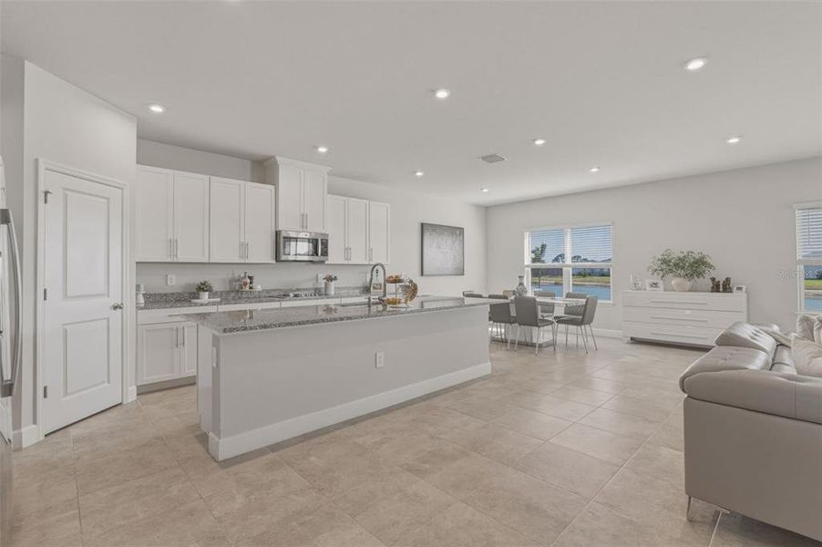 Furnished interior view inside a new home in West Port Single Family Homes, Port Charlotte (Image 9).