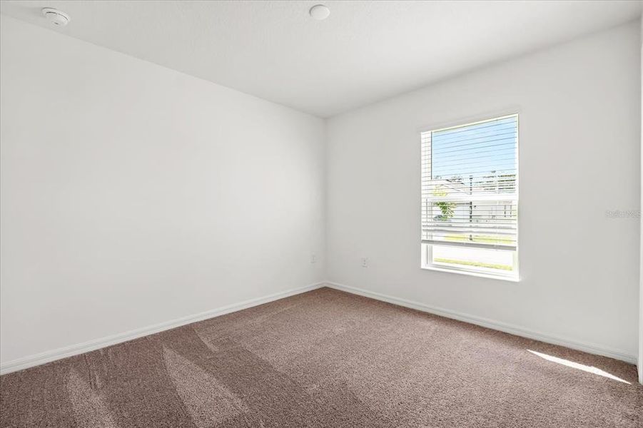 Spacious, unfurnished interior of a new home in Ross Creek, Lakeland (Image 13).