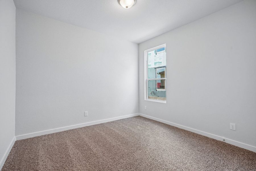 Spacious, unfurnished interior of a new home in The Meadows at Hunters Ranch, San Antonio (Image 39).