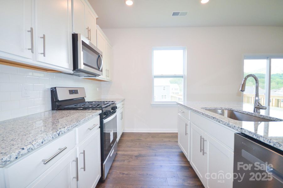 Furnished interior view inside a new home in Valleywood Farms, Waynesville (Image 7). Furnished interior view inside a new home in Valleywood Farms, Waynesville (Image 7).
