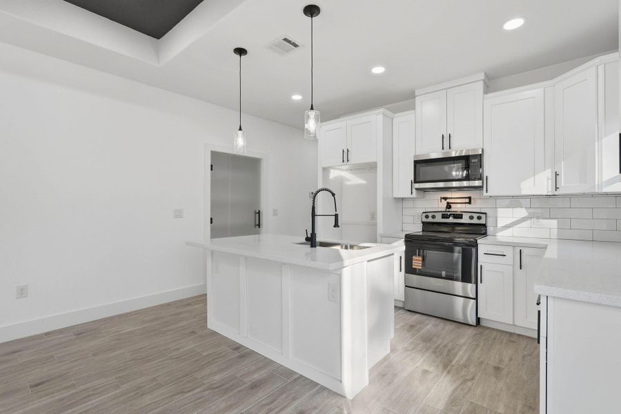 Furnished interior view inside a new home in , Willis (Image 5).