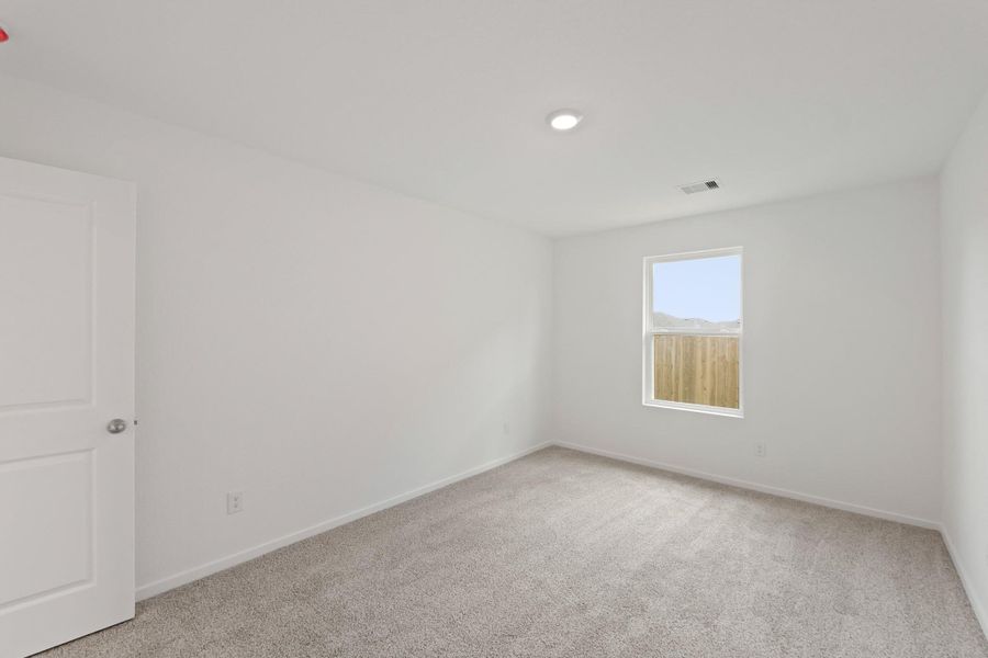 Spacious, unfurnished interior of a new home in The Canopies, Splendora (Image 13).