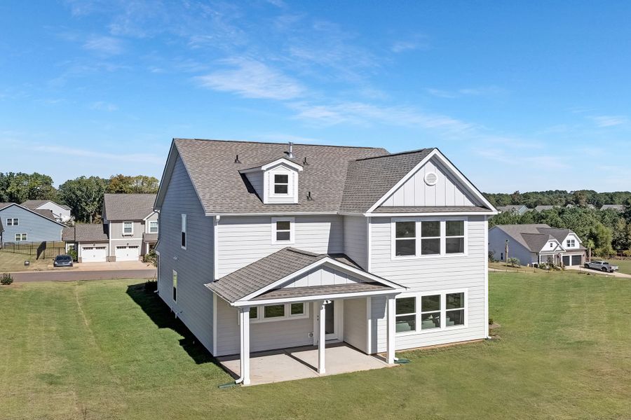 Front exterior of a new home in Edgewater - The Links, Lancaster, SC, highlighting curb appeal (Image 24). Front exterior of a new home in Edgewater - The Links, Lancaster, SC, highlighting curb appeal (Image 24).