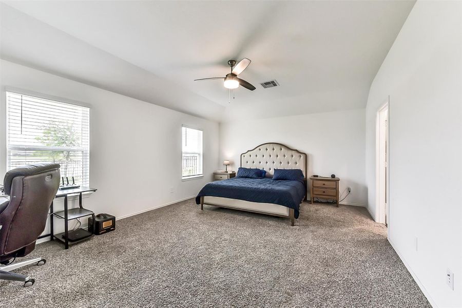 Furnished interior view inside a new home in Sunterra, Katy (Image 23).