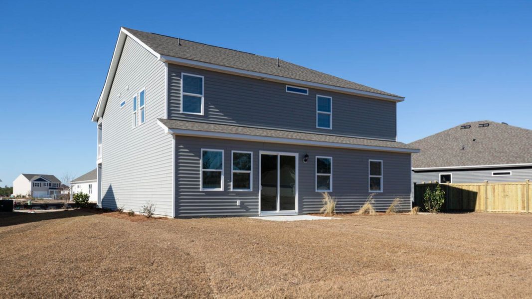 Exterior details and patio area of a home in The Preserve at Tidewater, Sneads Ferry (Image 20).