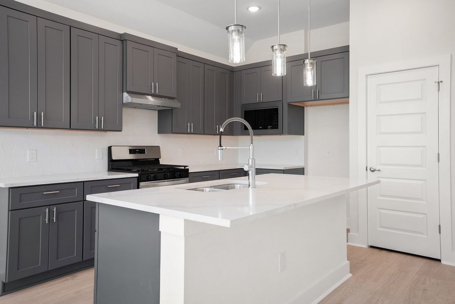 Furnished interior view inside a new home in Koenig Townhomes, Austin (Image 6). Furnished interior view inside a new home in Koenig Townhomes, Austin (Image 6).