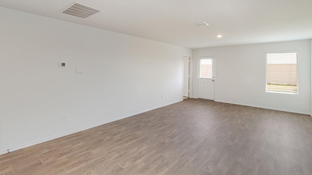 Spacious, unfurnished interior of a new home in Wayside, Uhland (Image 13).