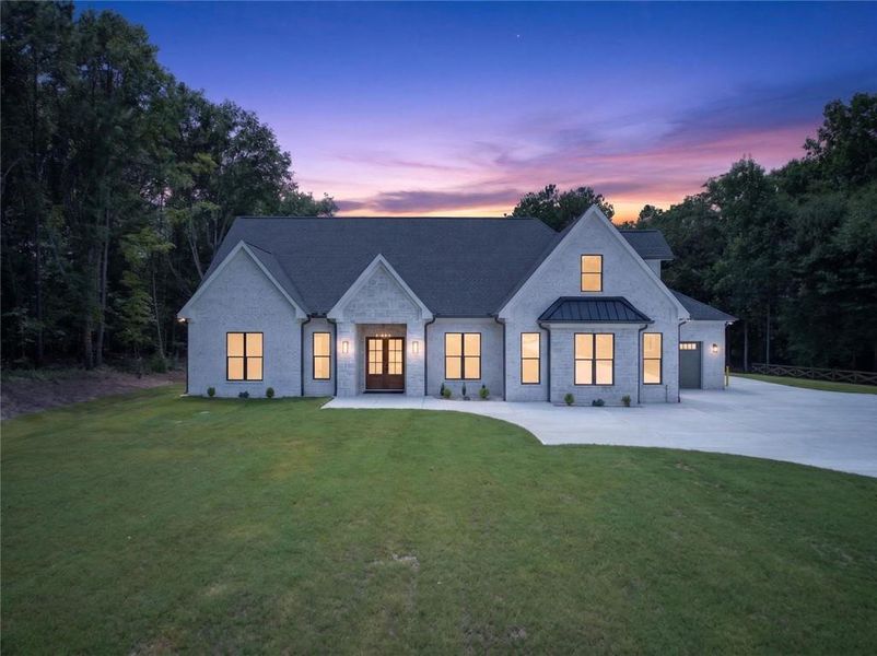 Front exterior of a new home in , Monroe, GA, highlighting curb appeal (Image 31). Front exterior of a new home in , Monroe, GA, highlighting curb appeal (Image 31).