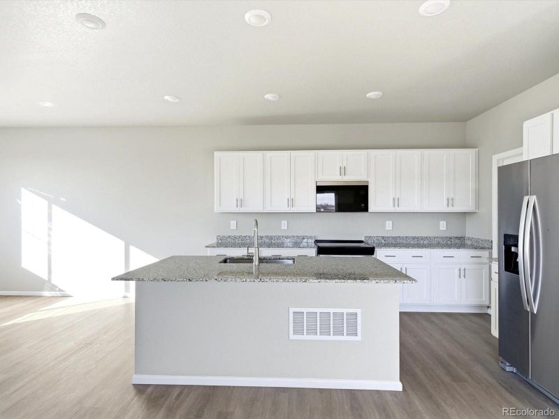 Furnished interior view inside a new home in , Thornton (Image 8).