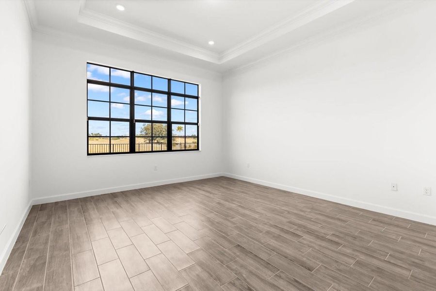 Furnished interior view inside a new home in Tesoro Club, Port St. Lucie (Image 15).