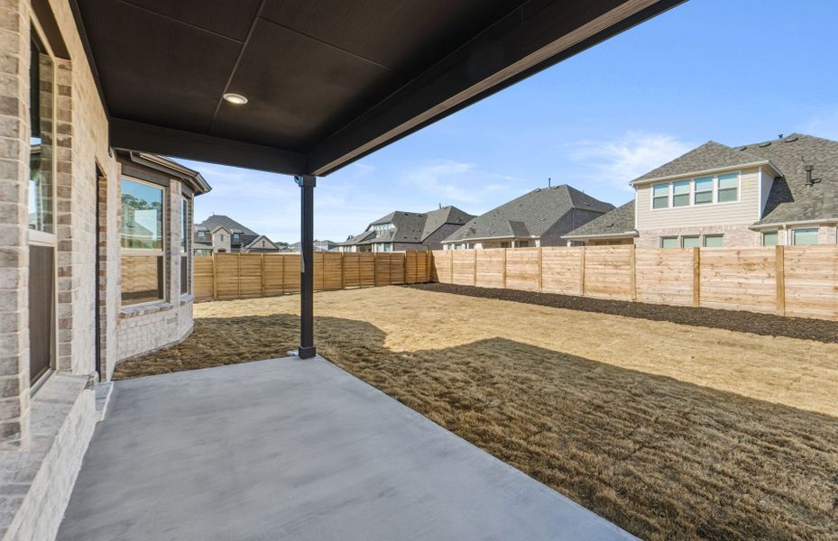 Exterior details and patio area of a home in Bluffview Reserve, Leander (Image 29).