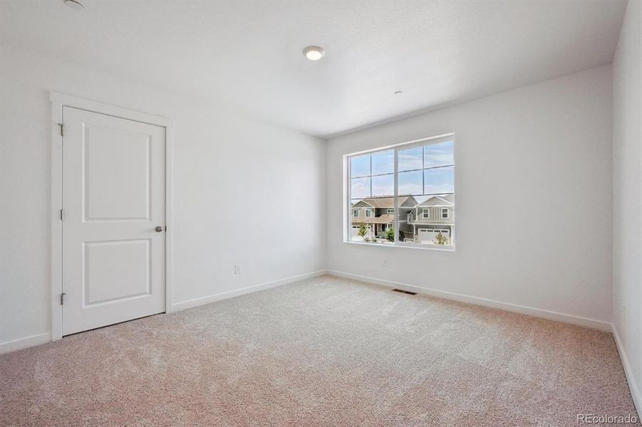 Spacious, unfurnished interior of a new home in Silver Peaks, Lochbuie (Image 15).