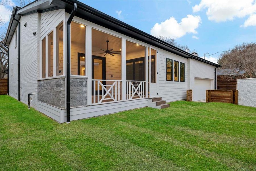 Plenty of space for back- yard fun w/ screened deck and part of one of the two dog runs on each side of the home