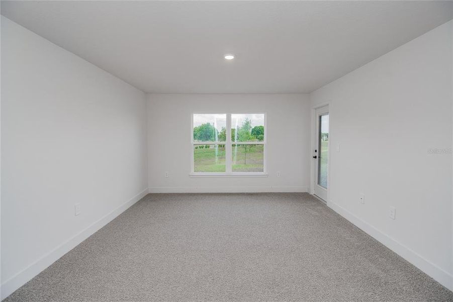 Spacious, unfurnished interior of a new home in Hickory Ridge Estates, Lake Wales (Image 23).
