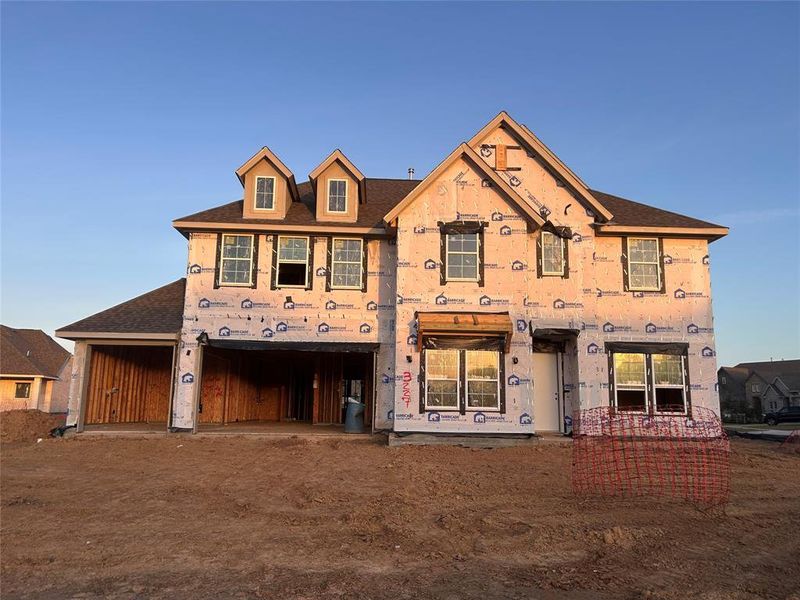 Two-story home with 5 bedrooms, 4.5 baths and 4 car garage