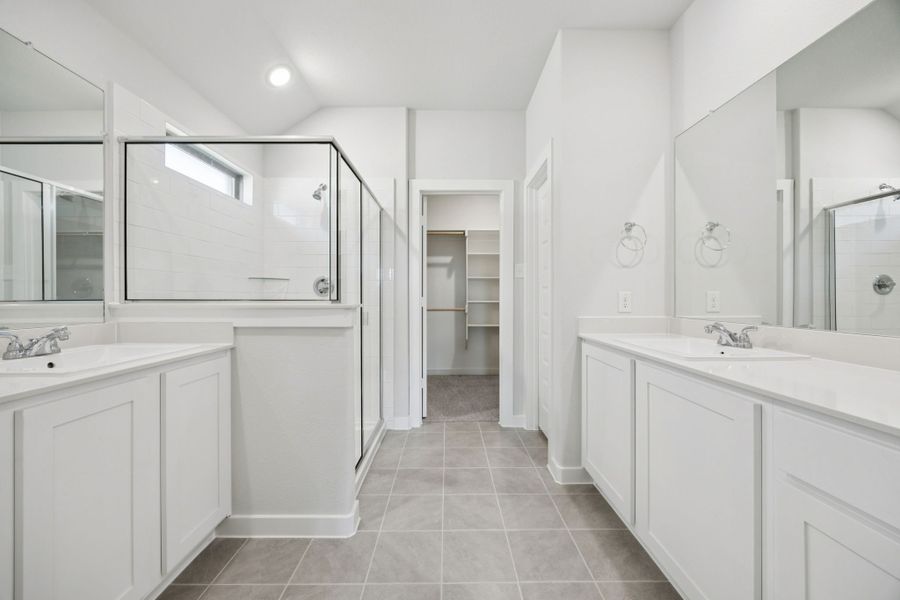 Primary Bathroom in the Heisman home plan by Trophy Signature Homes – REPRESENTATIVE PHOTO Primary Bathroom in the Heisman home plan by Trophy Signature Homes – REPRESENTATIVE PHOTO