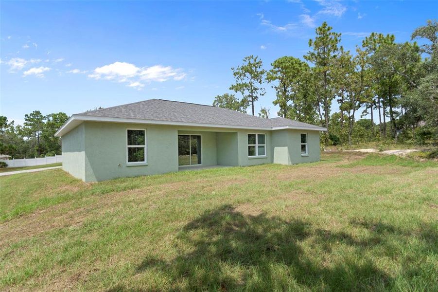 Front exterior of a new home in , Dunnellon, FL, highlighting curb appeal (Image 2).