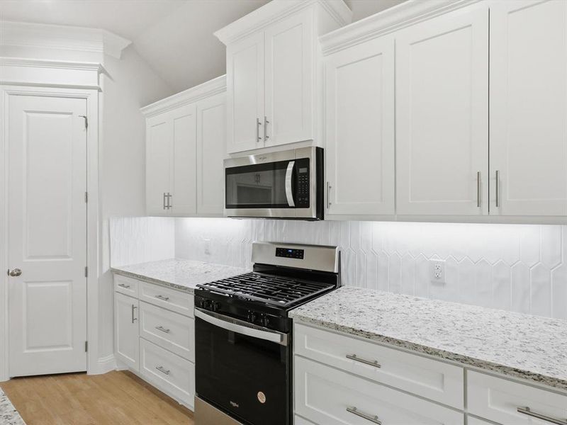 Furnished interior view inside a new home in , Godley (Image 9). Furnished interior view inside a new home in , Godley (Image 9).