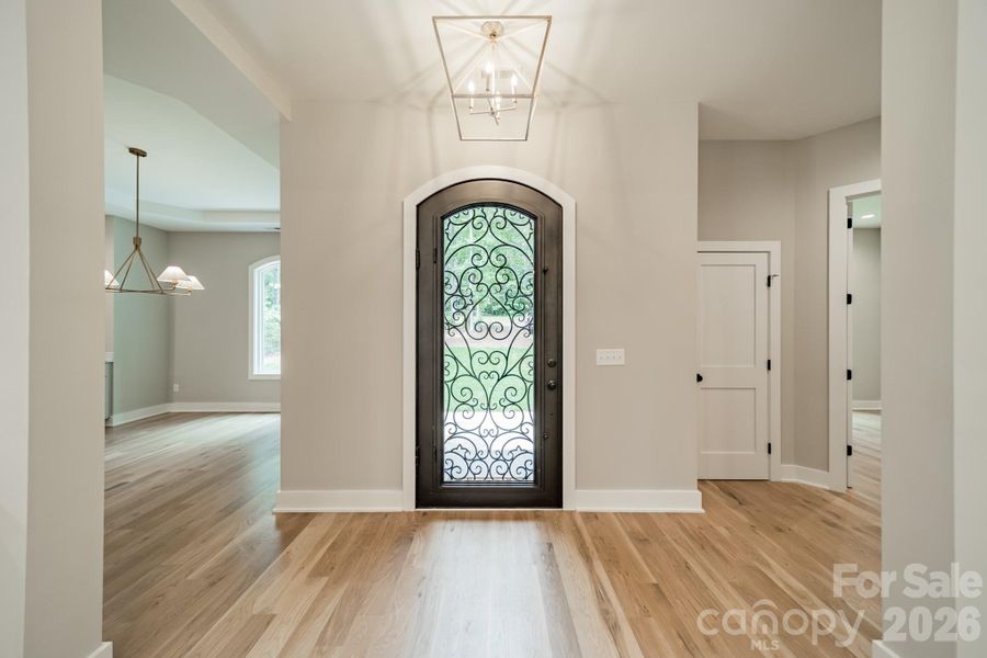 Welcome home to your stunning Lake Norman Estate on 2.03 acres of lakefront living!