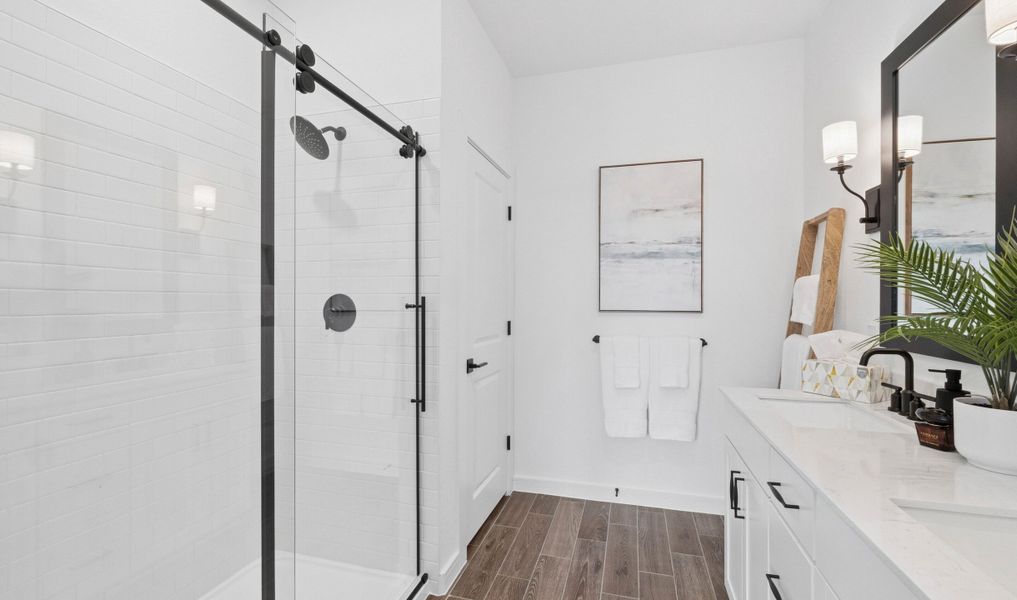 Primary bath with glass shower enclosure Primary bath with glass shower enclosure