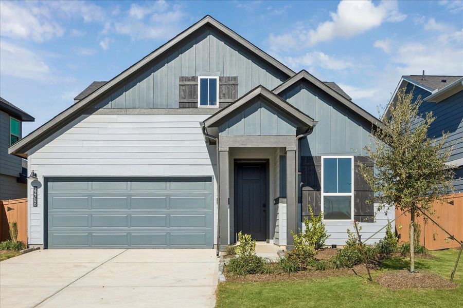 Front exterior of a new home in Elyson, Katy, TX, highlighting curb appeal (Image 1). Front exterior of a new home in Elyson, Katy, TX, highlighting curb appeal (Image 1).