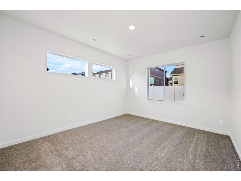 Spacious, unfurnished interior of a new home in Union Colony West, Greeley (Image 15).