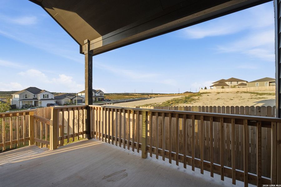 Exterior details and patio area of a home in The Woodlands at Medina Hills, Mico (Image 3).