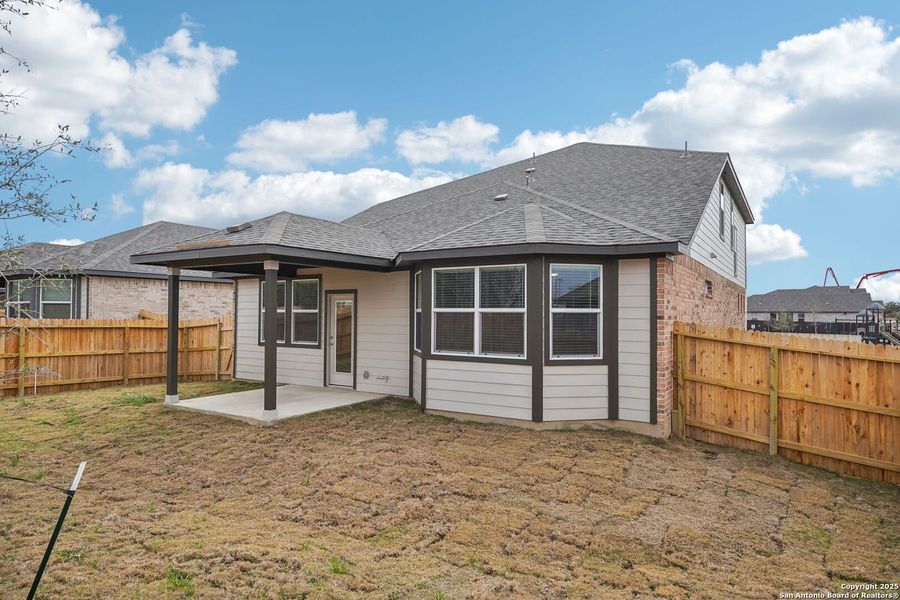Exterior details and patio area of a home in Carmel Ranch, Schertz (Image 30).